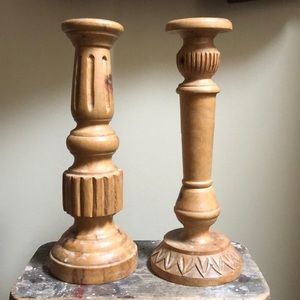 Two, mix matched carved wood candle stick holders